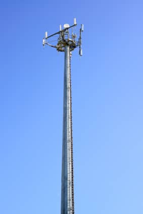 Telecommunications tower. Mobile phone station in a blue sky
